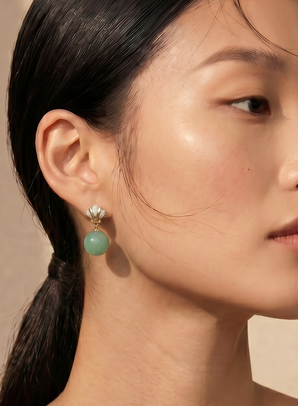 Woman wearing earrings with a neutral background